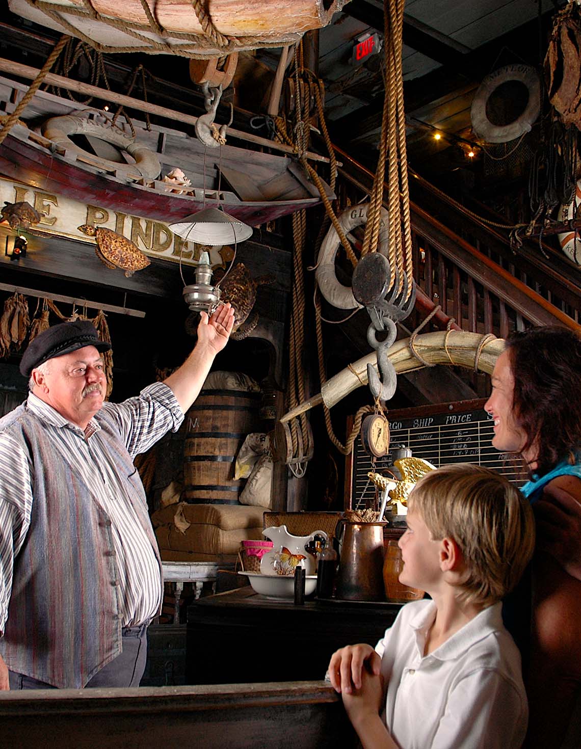 Tour guide and guests and Key West Shipwreck Treasure Museum
